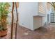 Exterior view of the courtyard featuring brick flooring and access to the home at 165 River North Walk, Atlanta, GA 30328