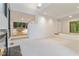 Spacious living room with recessed lighting and a glimpse of the outdoor view at 165 River North Walk, Atlanta, GA 30328