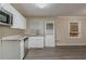 Bright kitchen featuring stainless steel appliances, updated countertops, and an open floor plan at 1906 Oak Valley Rd, Decatur, GA 30035