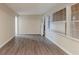 Open room showing fresh paint, new vinyl floors, and a bright window at 1906 Oak Valley Rd, Decatur, GA 30035
