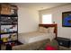 Bedroom featuring bed, sofa and shelves at 237 Arborview Dr, Mcdonough, GA 30252