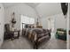 This bedroom features a cozy bed, musical instruments, and an ensuite bathroom, creating a personalized and comfortable space at 237 Arborview Dr, Mcdonough, GA 30252