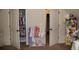 Open closet with organized clothing racks and shelves, showcasing storage and organization at 237 Arborview Dr, Mcdonough, GA 30252