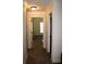 Bright hallway with crown molding leads to rooms, creating an open and inviting feel at 237 Arborview Dr, Mcdonough, GA 30252