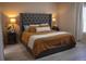 Comfortable bedroom featuring a tufted headboard and warm, inviting decor at 237 Arborview Dr, Mcdonough, GA 30252