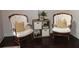 Cozy sitting area with two chairs, side table, and hardwood floors at 237 Arborview Dr, Mcdonough, GA 30252