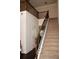 Carpeted staircase with dark wooden railing leads to the second level of the home at 237 Arborview Dr, Mcdonough, GA 30252