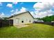 This home features a fenced backyard with a patio, perfect for entertaining and enjoying the outdoors at 2671 Calvary Dr, Hampton, GA 30228