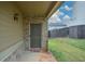 Close-up of the front door showcasing the welcoming entrance and exterior brick detail at 2671 Calvary Dr, Hampton, GA 30228