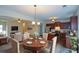 Inviting living room flows into eat-in kitchen area, creating an open and connected living space at 2671 Calvary Dr, Hampton, GA 30228