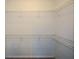 Spacious walk-in closet features wire shelving and ample storage space at 2671 Calvary Dr, Hampton, GA 30228