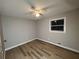 Bedroom with fan, vinyl floors and bright window at 2968 Cleburne Pkwy, Powder Springs, GA 30127