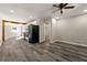 Open concept living room featuring gray flooring, recessed lighting, and a ceiling fan at 2968 Cleburne Pkwy, Powder Springs, GA 30127