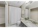 Well-lit bathroom with shower, granite countertop vanity, and neutral finishes for a clean and modern aesthetic at 4468 Windsor Oaks Dr, Marietta, GA 30066