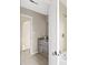 Well lit bathroom featuring a tub, shower with neutral tile, and open doorway to vanity with granite countertop at 4468 Windsor Oaks Dr, Marietta, GA 30066
