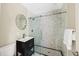 Modern bathroom with glass shower, patterned tile, contemporary vanity, and updated fixtures at 4468 Windsor Oaks Dr, Marietta, GA 30066