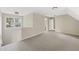 Expansive bedroom with a window seat offers a serene retreat with abundant natural light and plush carpet at 4468 Windsor Oaks Dr, Marietta, GA 30066
