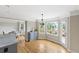 Bright dining area features hardwood floors, large windows with scenic views, and access to the outdoor deck at 4468 Windsor Oaks Dr, Marietta, GA 30066