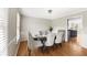 Dining room featuring hardwood floors and modern furniture with soft, natural lighting at 4468 Windsor Oaks Dr, Marietta, GA 30066