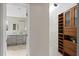 Open doorway reveals a renovated bathroom and custom closet system, enhancing the home's appeal at 4468 Windsor Oaks Dr, Marietta, GA 30066