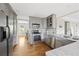 Gourmet kitchen with stainless-steel appliances, granite countertops, custom cabinets, and hardwood floors at 4468 Windsor Oaks Dr, Marietta, GA 30066
