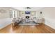 Bright living room with hardwood floors, a cozy fireplace, and neutral decor at 4468 Windsor Oaks Dr, Marietta, GA 30066
