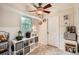 Bright kitchen space features great natural light, tile flooring and ceiling fan at 5478 Janice Ln, Stone Mountain, GA 30087
