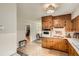 Efficient kitchen layout with plenty of cabinet space and access to other areas of the home at 5478 Janice Ln, Stone Mountain, GA 30087