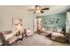 Comfortable living room is naturally lit and features a comfortable sofa and chairs at 5478 Janice Ln, Stone Mountain, GA 30087