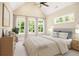Cozy bedroom with large windows, soft lighting, and comfortable furnishings at 1150 Sweet Mia Ln, Powder Springs, GA 30127