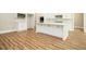 Well-lit kitchen featuring an island and modern appliances at 1150 Sweet Mia Ln, Powder Springs, GA 30127