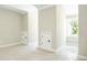 A room with white walls and trim and small doors lining the walls at 1150 Sweet Mia Ln, Powder Springs, GA 30127