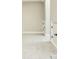 Spacious room with new carpet and small doors on either side of the wall at 1150 Sweet Mia Ln, Powder Springs, GA 30127
