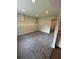 Finished basement area with neutral carpet and bright recessed lighting at 1951 Bergerac Sw Ct, Marietta, GA 30008