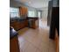 The kitchen has tile floors, wooden cabinets and stainless-steel appliances at 1951 Bergerac Sw Ct, Marietta, GA 30008