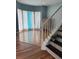Living room featuring bright open space and stairs at 1951 Bergerac Sw Ct, Marietta, GA 30008