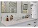 Bright bathroom showcasing a double sink vanity with quartz countertop and modern fixtures at 47 Roseclair Se Dr, Atlanta, GA 30317
