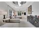 Spacious primary bedroom with sitting area, patterned ceiling, and natural light at 47 Roseclair Se Dr, Atlanta, GA 30317