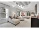 Spacious primary bedroom with sitting area, patterned ceiling, and ample natural light at 47 Roseclair Se Dr, Atlanta, GA 30317