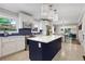 Spacious kitchen with navy blue island, tile floors, and stainless appliances at 47 Roseclair Se Dr, Atlanta, GA 30317