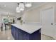 Kitchen with pendant lighting and a navy blue kitchen island at 47 Roseclair Se Dr, Atlanta, GA 30317