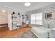Bright office space with dual workstation, unique decor, and zebra rug at 47 Roseclair Se Dr, Atlanta, GA 30317