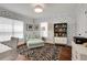 Eye-catching office space featuring statement wallpaper, vintage decor, and hardwood floors at 47 Roseclair Se Dr, Atlanta, GA 30317