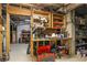 Utility basement with shelves and work area perfect for storage and DIY projects at 5925 Water Mark Dr, Cumming, GA 30040