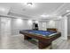 Basement featuring pool table, foosball table, arcade game and neutral paint at 5925 Water Mark Dr, Cumming, GA 30040