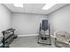 Home gym featuring weights, an inversion table, and a comfortable seat, perfect for workouts at 5925 Water Mark Dr, Cumming, GA 30040