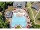 Aerial view showcasing the community pool with ample seating and recreational areas at 5925 Water Mark Dr, Cumming, GA 30040