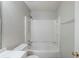 A clean bathroom featuring a bathtub and a toilet at 6185 Marbut Farms, Lithonia, GA 30058