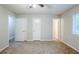 Spacious bedroom with three closets and a window for natural light at 6185 Marbut Farms, Lithonia, GA 30058