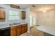 Bright dining area with backyard access and modern finishes at 6185 Marbut Farms, Lithonia, GA 30058